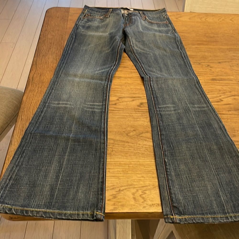 COLINS JEANS regular waist, distressed, flare jeans.  New with tags